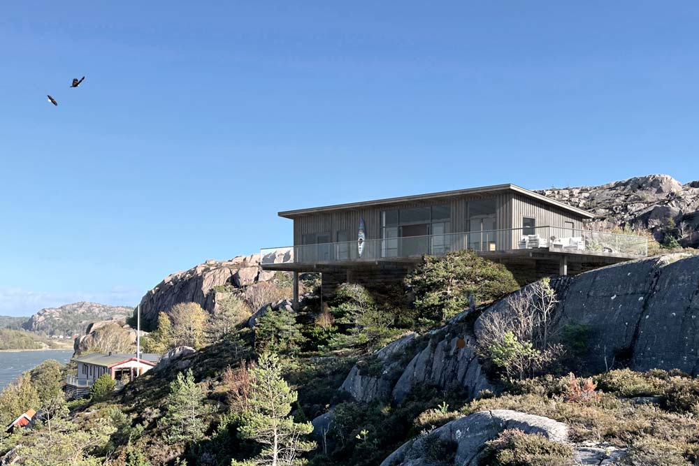 Hus med berg runtom